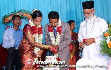 Regi Preetha Wedding Reception Photos